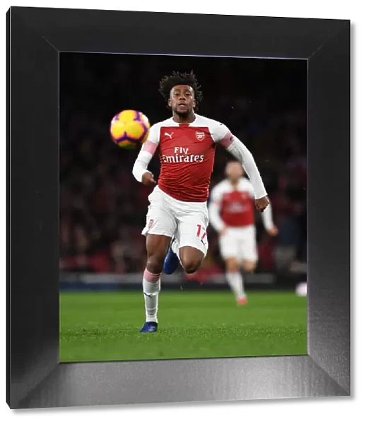 Arsenal's Alex Iwobi in Action against Huddersfield Town, Premier League (2018-19)