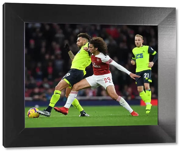 Guendouzi vs Williams: Intense Clash Between Arsenal's Matteo Guendouzi and Huddersfield's Danny Williams in the Premier League