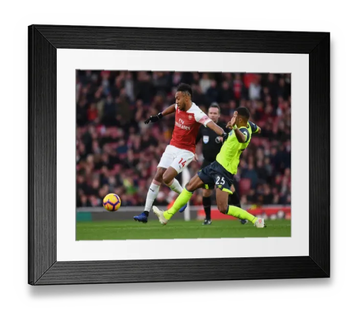 Framed Print : Arsenal's Aubameyang Outmaneuvers Huddersfield's Jorgensen
