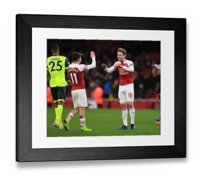 Framed Print : Arsenal: Monreal and Torreira Celebrate Victory over Huddersfield Town Framed Print : Arsenal: Monreal and Torreira Celebrate Victory over Huddersfield Town