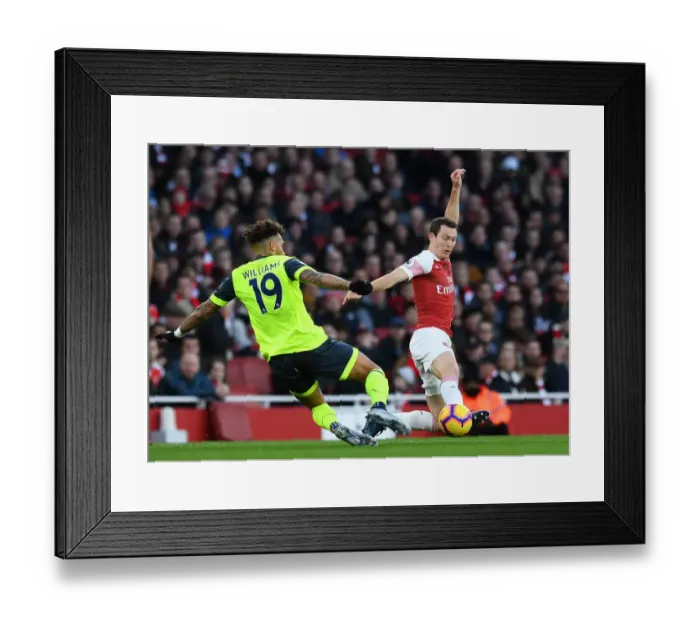 Framed Print : Arsenal vs. Huddersfield: Lichtsteiner Tackles Williams in Premier League Clash Framed Print : Arsenal vs. Huddersfield: Lichtsteiner Tackles Williams in Premier League Clash