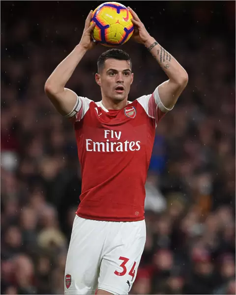 Granit Xhaka: Arsenal's Midfield Maestro in Action Against Huddersfield Town, Premier League 2018-19