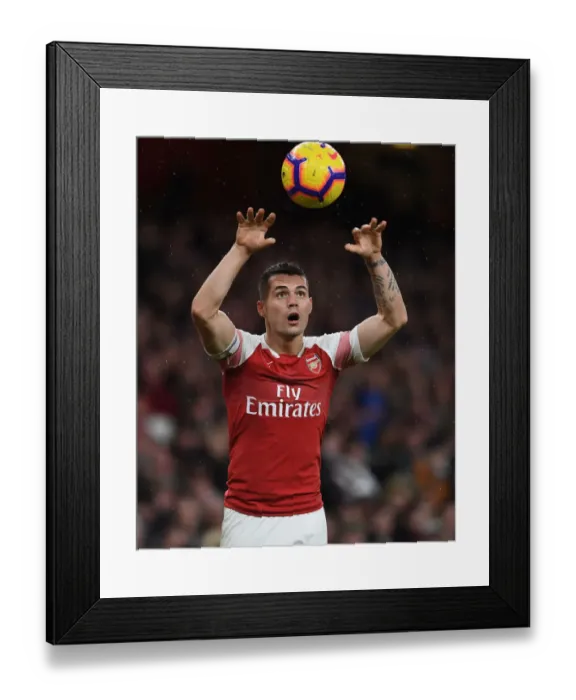 Framed Print : Granit Xhaka in Action: Arsenal vs Huddersfield Town, Premier League (2018-19)