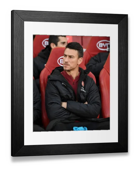 Framed Print : Arsenal's Koscielny: Unwavering Focus Before Arsenal vs Huddersfield Framed Print : Arsenal's Koscielny: Unwavering Focus Before Arsenal vs Huddersfield