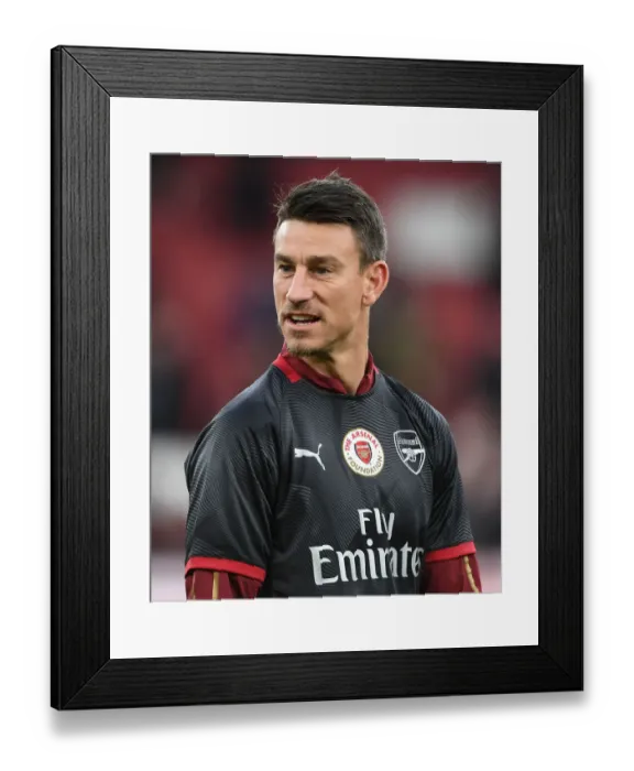 Framed Print : Laurent Koscielny: Arsenal's Defensive Fortress Ahead of Huddersfield Town Clash Framed Print : Laurent Koscielny: Arsenal's Defensive Fortress Ahead of Huddersfield Town Clash