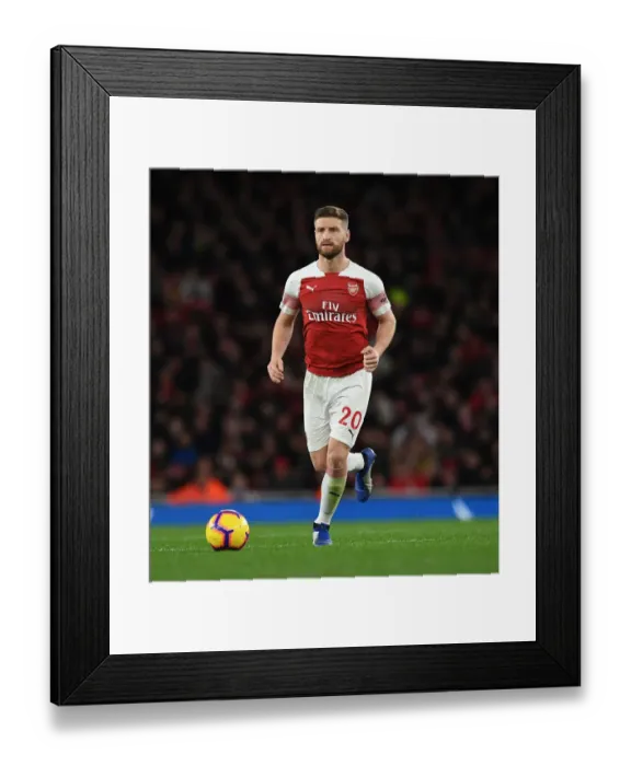 Framed Print : Shkodran Mustafi Focuses in Arsenal's Battle Against Huddersfield Town (Arsenal v Huddersfield Town - 2018-19) Framed Print : Shkodran Mustafi Focuses in Arsenal's Battle Against Huddersfield Town (Arsenal v Huddersfield Town - 2018-19)
