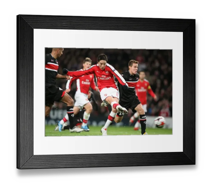 Framed Print : Samir Nasri scores Arsenals 2nd goal under pressure Framed Print : Samir Nasri scores Arsenals 2nd goal under pressure