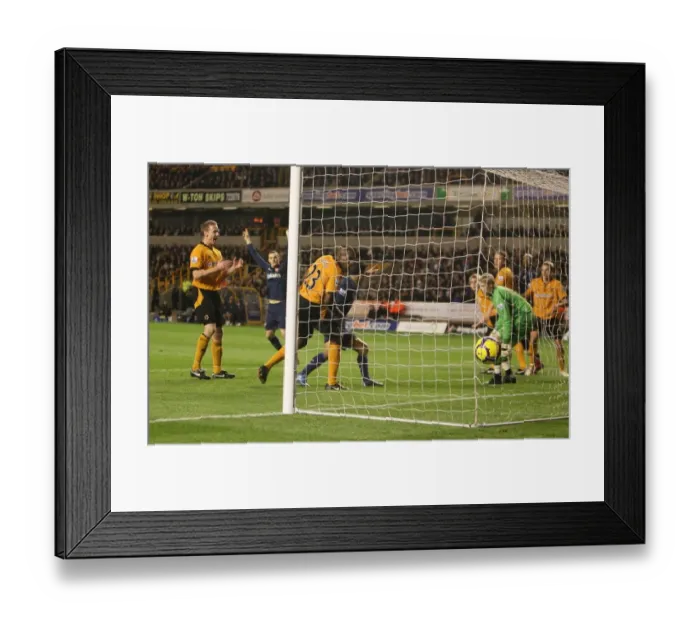Framed Print : Arsenal's Fortune: Zubar's Own Goal Seals 4-1 Victory Over Wolves Framed Print : Arsenal's Fortune: Zubar's Own Goal Seals 4-1 Victory Over Wolves