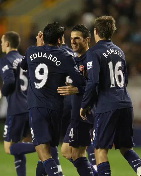 Celebrating Glory: Fabregas, Ramsey, and Eduardo's Unforgettable Goal Fest at Molineux (4-1 Arsenal)