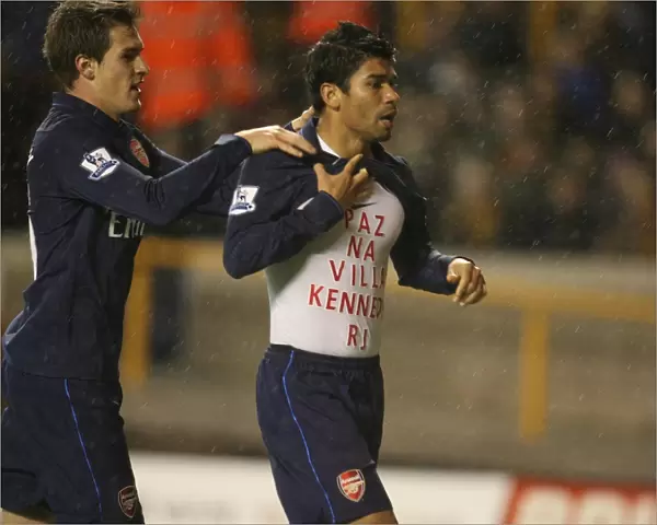 Eduardo and Aaron Ramsey celebrate the 2nd Arsenal goal