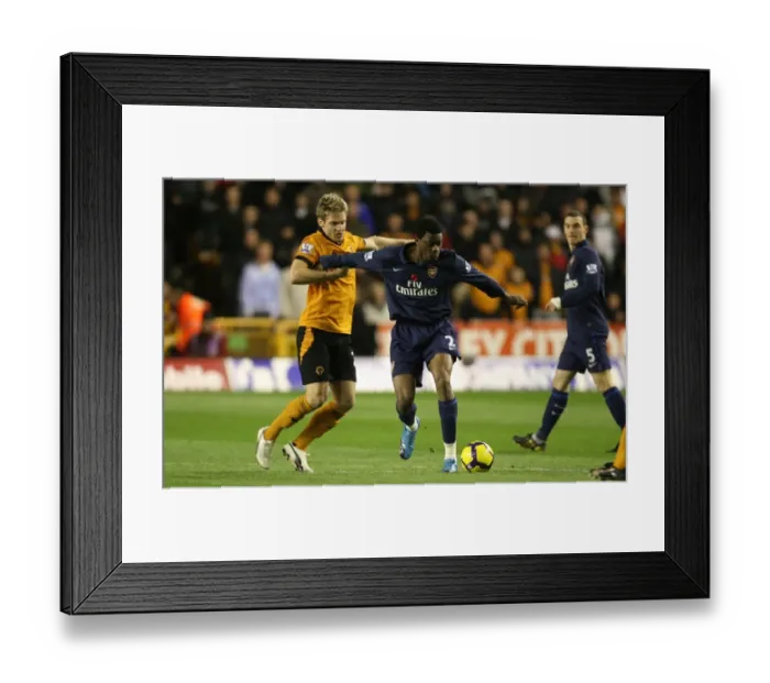 Framed Print : Arsenal's Abou Diaby Scores Twice Against Wolves Kevin Doyle in 1:4 Victory, Barclays Premier League, Molineux Stadium, 2009