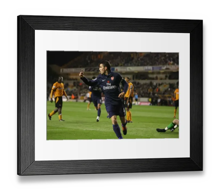 Framed Print : Cesc Fabregas Triumph: Arsenal's 4-1 Victory Over Wolves in Premier League Framed Print : Cesc Fabregas Triumph: Arsenal's 4-1 Victory Over Wolves in Premier League
