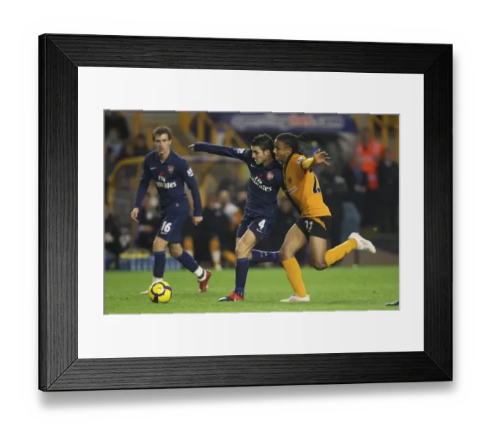 Framed Print : Cesc Fabregas (Arsenal) Michael Mancienne (Wolves) Framed Print : Cesc Fabregas (Arsenal) Michael Mancienne (Wolves)