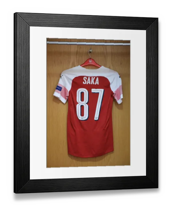 Framed Print : Arsenal Changing Room: Buyako Sakas Shirt Hang Ahead of Arsenal vs Qarabag UEFA Europa League Match