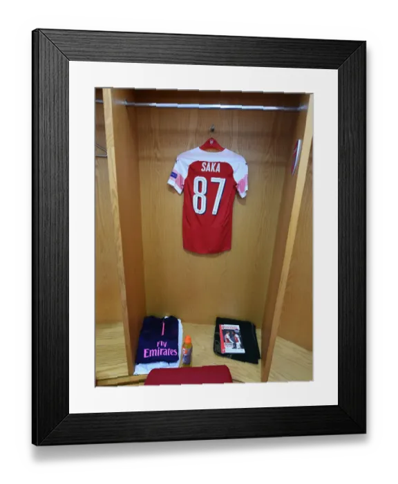 Framed Print : Arsenal Changing Room: Buyako Sakas Europa League Shirt Prepared for Qarabag Clash
