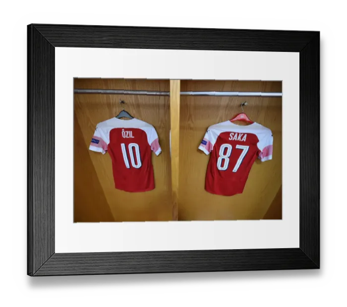 Framed Print : Arsenal Football Club: Mesut Ozil and Bukayo Saka Gear Up for Arsenal vs Qarabag (UEFA Europa League 2018-19) - Changing Room Preparation