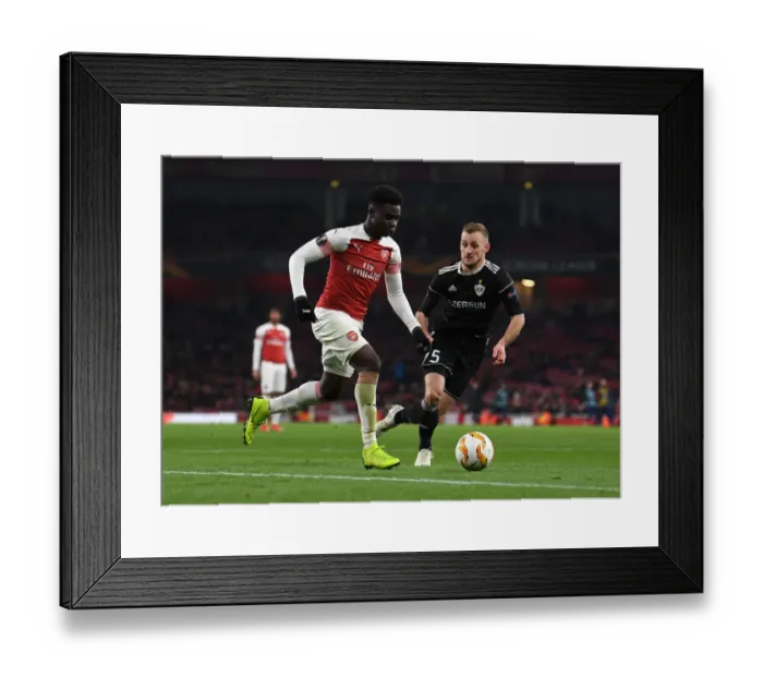 Framed Print : Bukayo Saka vs Maksin Medvedev: A Battle at the Emirates - Arsenal vs Qarabag UEFA Europa League Framed Print : Bukayo Saka vs Maksin Medvedev: A Battle at the Emirates - Arsenal vs Qarabag UEFA Europa League