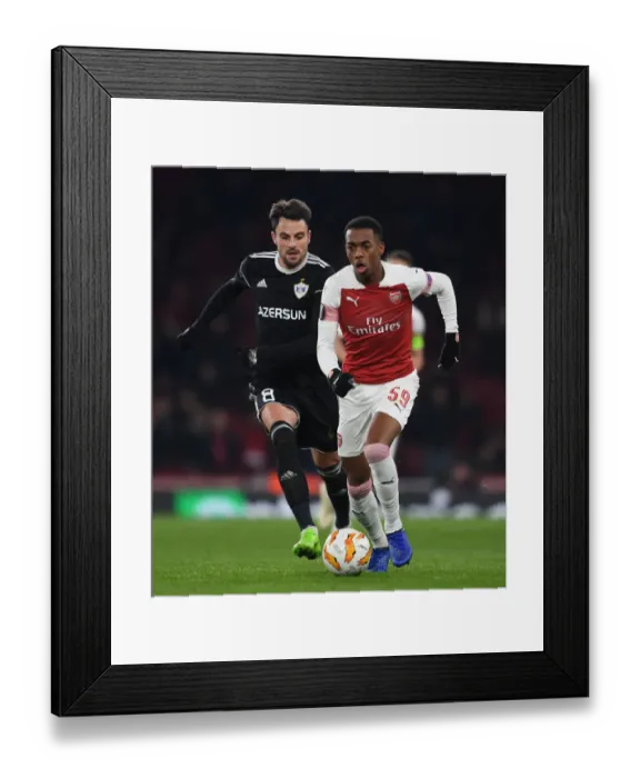 Framed Print : Arsenal's Joe Willock Clashes with Michel in Europa League Match against Qarabag