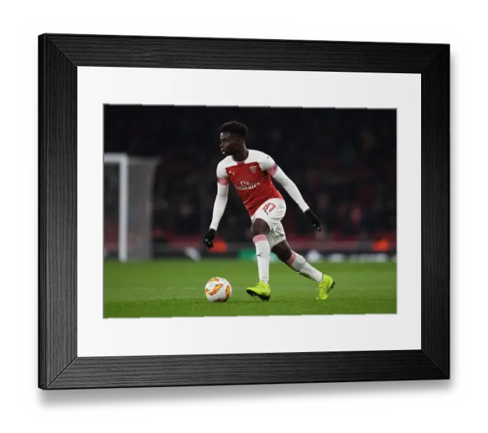 Framed Print : Bukayo Saka in Action: Arsenal's Young Star Shines in Europa League Match against Qarabag