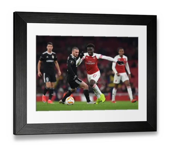 Framed Print : Bukayo Saka vs Gara Gareyev: Arsenal vs Qarabag, UEFA Europa League Clash