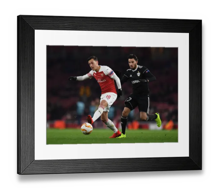 Framed Print : Mesut Ozil Fends Off Abdellah Zoubir: Arsenal vs Qarabag, UEFA Europa League Framed Print : Mesut Ozil Fends Off Abdellah Zoubir: Arsenal vs Qarabag, UEFA Europa League
