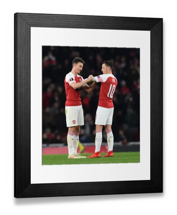 Framed Print : Arsenal: Koscielny Passes Captaincy to Ozil vs Qarabag, Europa League 2018-19 Framed Print : Arsenal: Koscielny Passes Captaincy to Ozil vs Qarabag, Europa League 2018-19