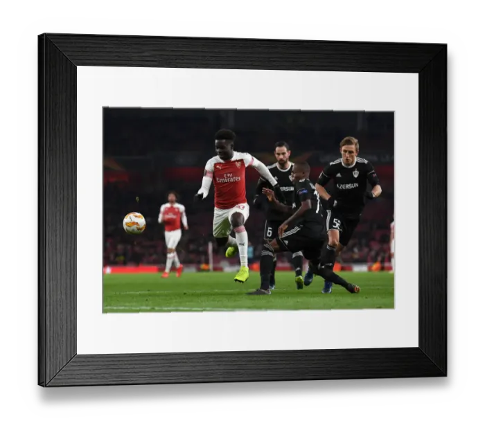Framed Print : Bukayo Saka vs. Donald Guerrier: Arsenal vs. Qarabag Football Battle, UEFA Europa League 2018-19