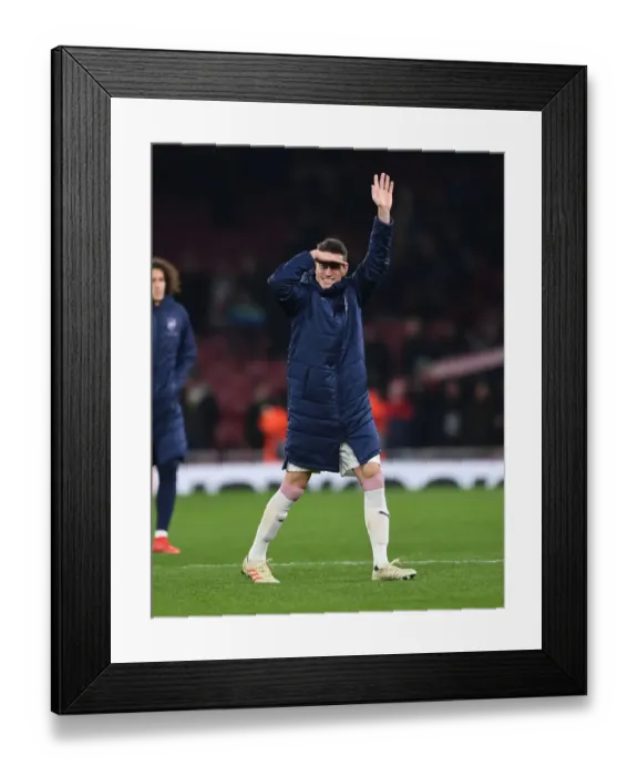 Framed Print : Arsenal's Unyielding Defense: Koscielny's Grit in Europa League Battle Against Qarabag