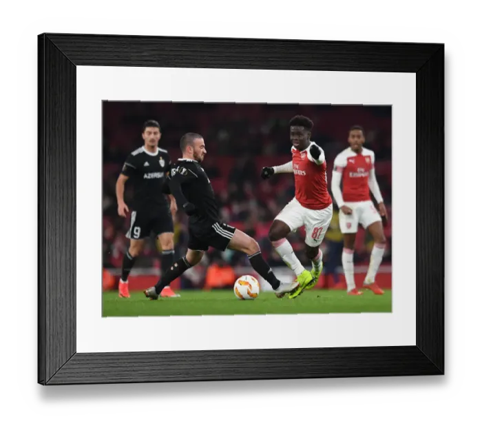 Framed Print : Bukayo Saka vs. Gara Gareyev: Arsenal vs. Qarabag UEFA Europa League Clash