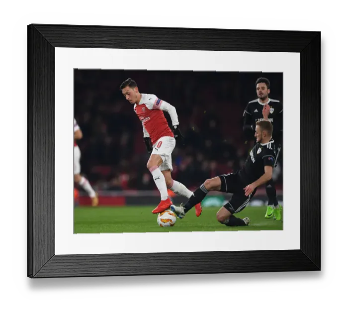 Framed Print : Mesut Ozil's Gorgeous Backheel: A Memorable Moment from Arsenal's Europa League Triumph over Qarabag