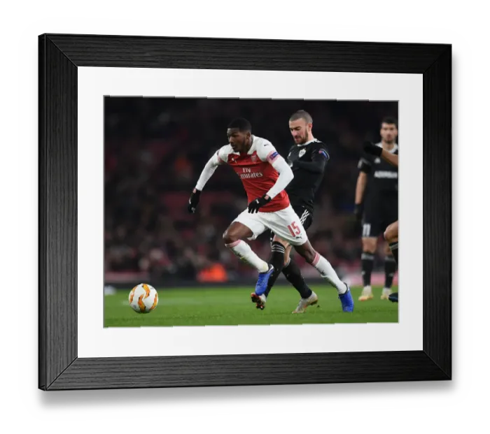 Framed Print : Arsenal's Ainsley Maitland-Niles Faces Off Against Qarabag's Maksin Medvedev in Europa League Clash Framed Print : Arsenal's Ainsley Maitland-Niles Faces Off Against Qarabag's Maksin Medvedev in Europa League Clash