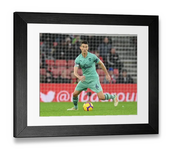 Framed Print : Laurent Koscielny Focused Amidst Southampton vs Arsenal Premier League Clash Framed Print : Laurent Koscielny Focused Amidst Southampton vs Arsenal Premier League Clash