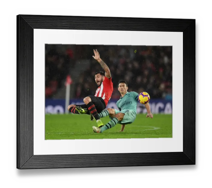 Framed Print : Koscielny vs. Austin: A Premier League Battle - Arsenal's Laurent Koscielny Clashes with Southampton's Charlie Austin (December 2018) Framed Print : Koscielny vs. Austin: A Premier League Battle - Arsenal's Laurent Koscielny Clashes with Southampton's Charlie Austin (December 2018)