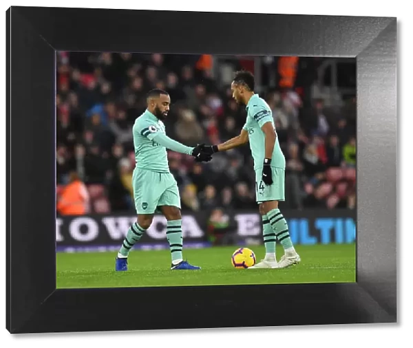Lacazette and Aubameyang: United in Friendship and Rivalry - Arsenal's Striking Duo Shake Hands Before Second Half at Southampton (2018-19)
