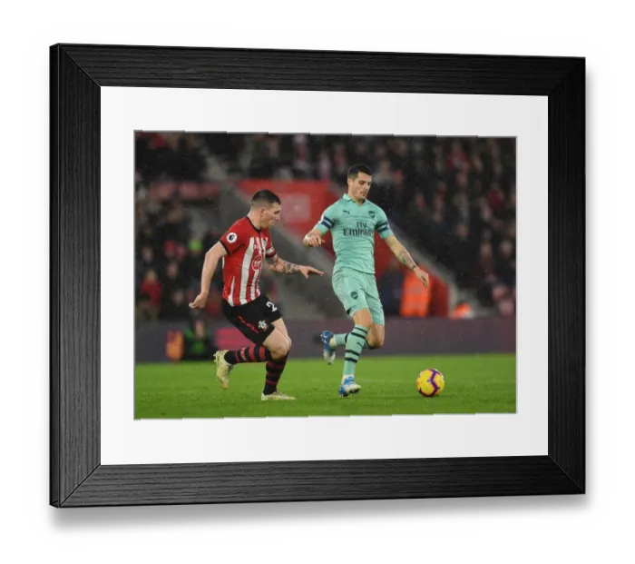 Framed Print : Clash of Midfielders: Xhaka vs. Hojbjerg - Southampton vs. Arsenal, Premier League 2018-19 Framed Print : Clash of Midfielders: Xhaka vs. Hojbjerg - Southampton vs. Arsenal, Premier League 2018-19