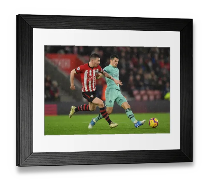 Framed Print : Clash of Midfield Titans: Xhaka vs. Hojbjerg - A Battle in the Heart of the Southampton vs. Arsenal Rivalry, Premier League, 2018-19
