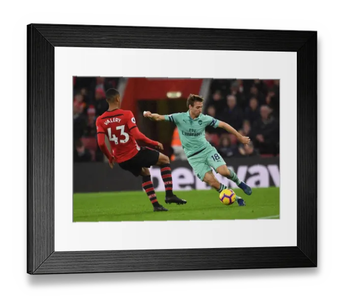 Framed Print : Nacho Monreal (Arsenal) Yan Valery (Southampton). Southampton 3: 2 Arsenal. Premier League