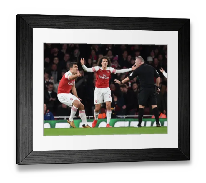 Framed Print : Arsenal's Sokratis and Guendouzi Protest Ref's Decision in Intense Arsenal vs. Tottenham Carabao Cup Clash Framed Print : Arsenal's Sokratis and Guendouzi Protest Ref's Decision in Intense Arsenal vs. Tottenham Carabao Cup Clash