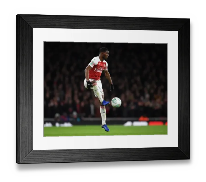 Framed Print : Carabao Cup Showdown: Ainsley Maitland-Niles Leads Arsenal Against Tottenham