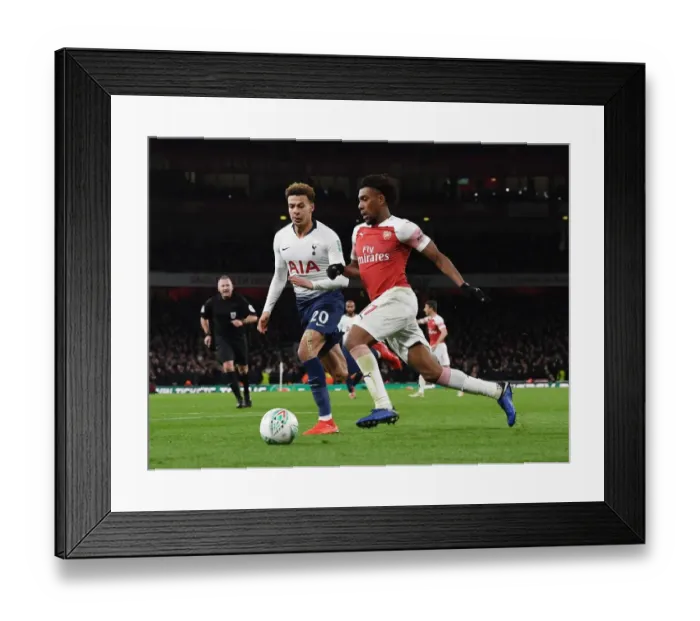 Framed Print : London Rivalry Erupts: Iwobi vs. Alli - Arsenal vs. Tottenham in the Carabao Cup Showdown