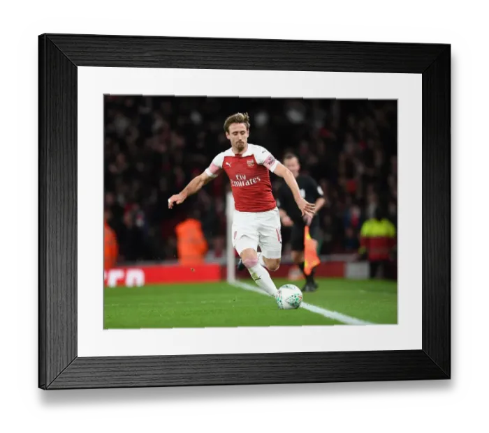 Framed Print : Monreal's Intense Concentration: Arsenal vs. Tottenham in Carabao Cup Quarterfinals Framed Print : Monreal's Intense Concentration: Arsenal vs. Tottenham in Carabao Cup Quarterfinals