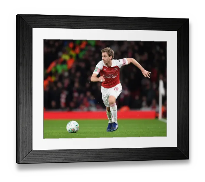 Framed Print : Monreal's Unwavering Concentration: Arsenal vs. Tottenham Carabao Cup Clash