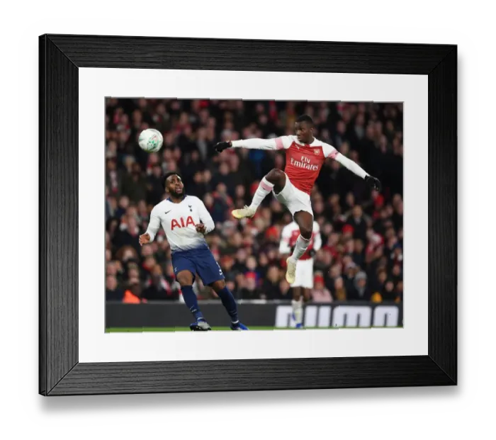 Framed Print : Nketiah Soars Above Rose: Arsenal's Carabao Cup Triumph over Tottenham
