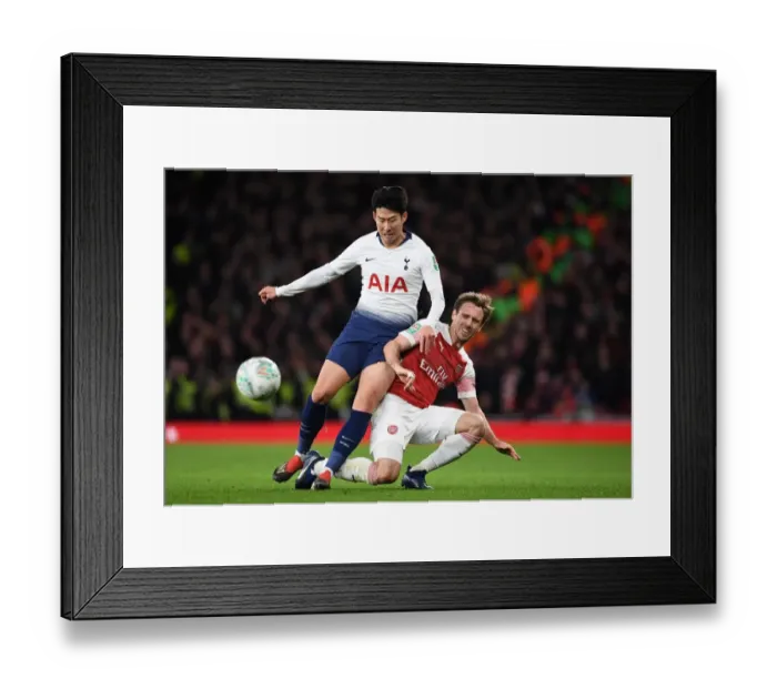 Framed Print : Monreal vs. Son: A Carabao Cup Battle at the Emirates