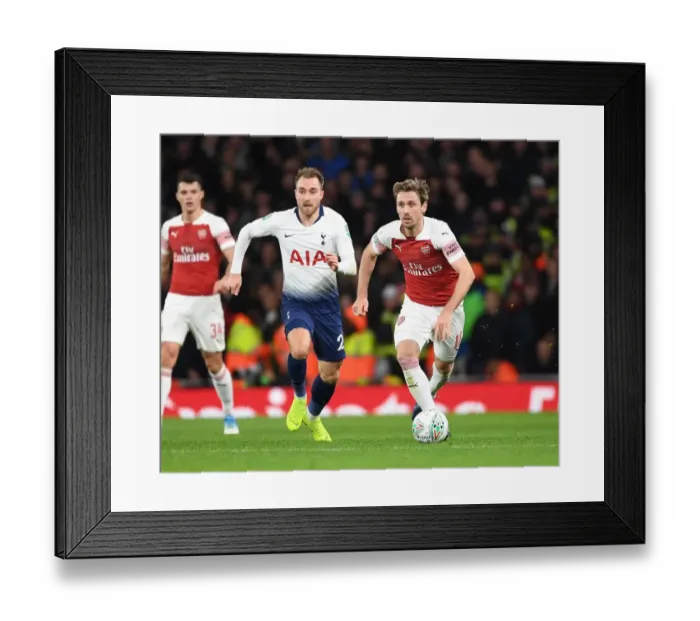 Framed Print : Monreal Outmaneuvers Eriksen: Arsenal's Thrilling Carabao Cup Victory Over Tottenham Framed Print : Monreal Outmaneuvers Eriksen: Arsenal's Thrilling Carabao Cup Victory Over Tottenham