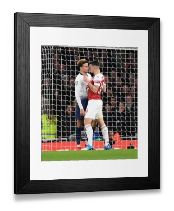 Framed Print : Arsenal vs. Tottenham: Carabao Cup Clash - Xhaka vs. Alli's Intense Battle Framed Print : Arsenal vs. Tottenham: Carabao Cup Clash - Xhaka vs. Alli's Intense Battle
