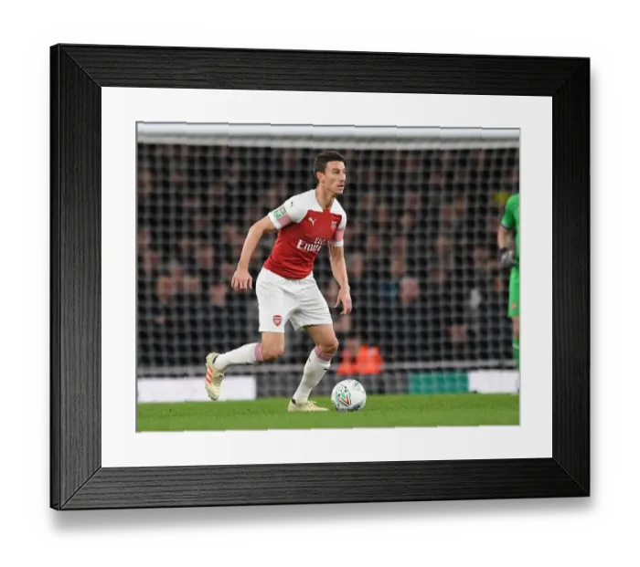 Framed Print : Laurent Koscielny Focuses in Arsenal-Tottenham Carabao Cup Clash Framed Print : Laurent Koscielny Focuses in Arsenal-Tottenham Carabao Cup Clash