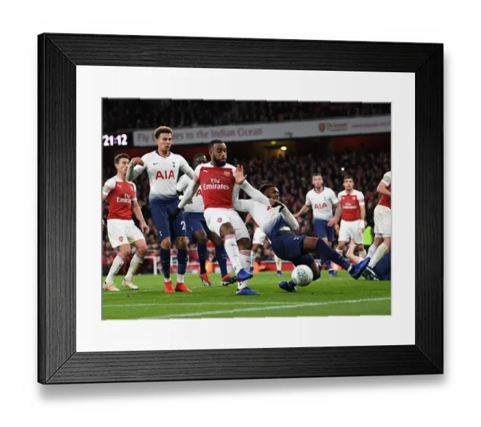 Framed Print : Arsenal's Alexandre Lacazette Faces Off Against Tottenham's Danny Rose in Carabao Cup Quarterfinal Showdown Framed Print : Arsenal's Alexandre Lacazette Faces Off Against Tottenham's Danny Rose in Carabao Cup Quarterfinal Showdown