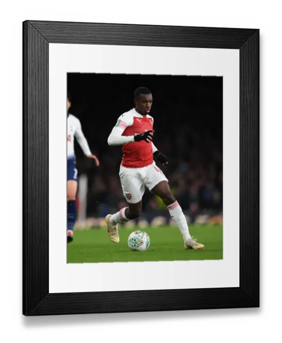 Framed Print : Arsenal's Eddie Nketiah Goes Head-to-Head with Tottenham in Carabao Cup Showdown