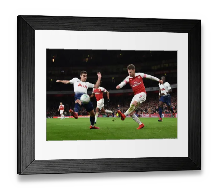 Framed Print : Arsenal's Aaron Ramsey Faces Off Against Tottenham's Harry Winks in Carabao Cup Quarterfinal Showdown Framed Print : Arsenal's Aaron Ramsey Faces Off Against Tottenham's Harry Winks in Carabao Cup Quarterfinal Showdown